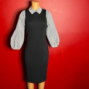 New black dress with black & white puff sleeves. Size small.